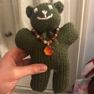 Handmade teddy bear and bracelet